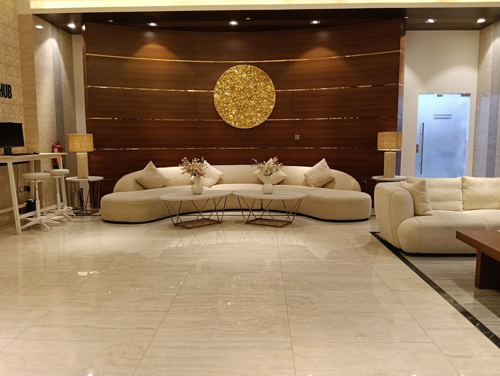 Reception lobby lounge with golden feature wall